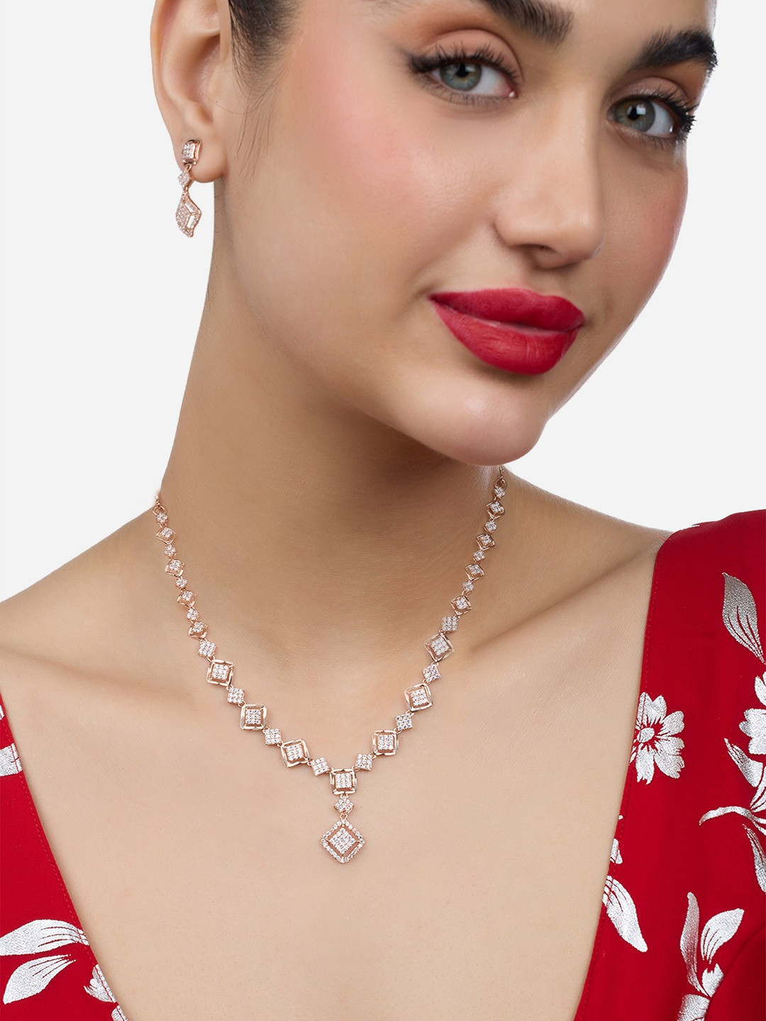 

Zaveri Pearls Rose Gold-Plated Cubic Zirconia Studded Jewellery Set