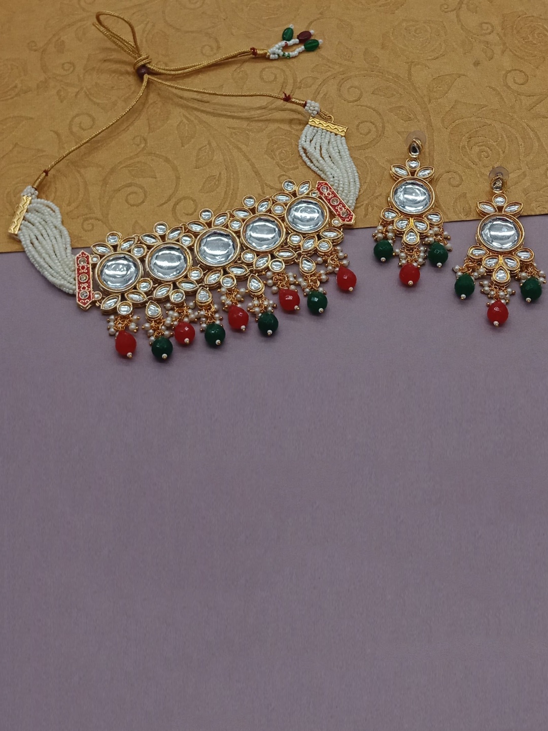 

AASHISH IMITATION Gold Plated Kundan Studded Jewellery Set