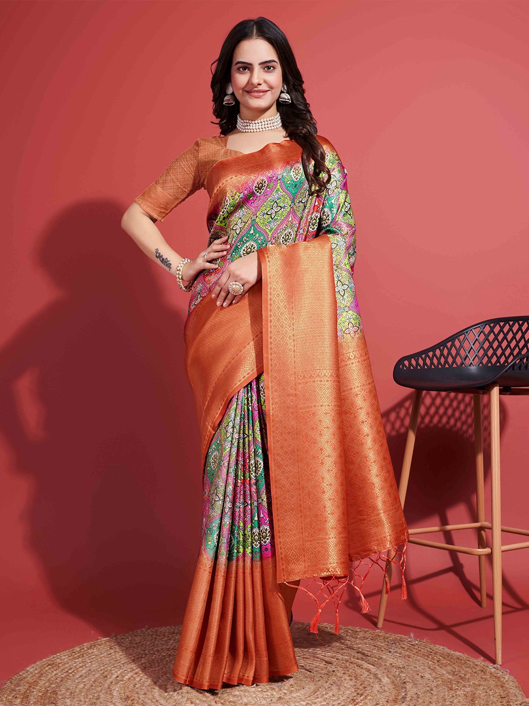 

Mitera Orange Floral Woven Design Zari Kanjeevaram Saree