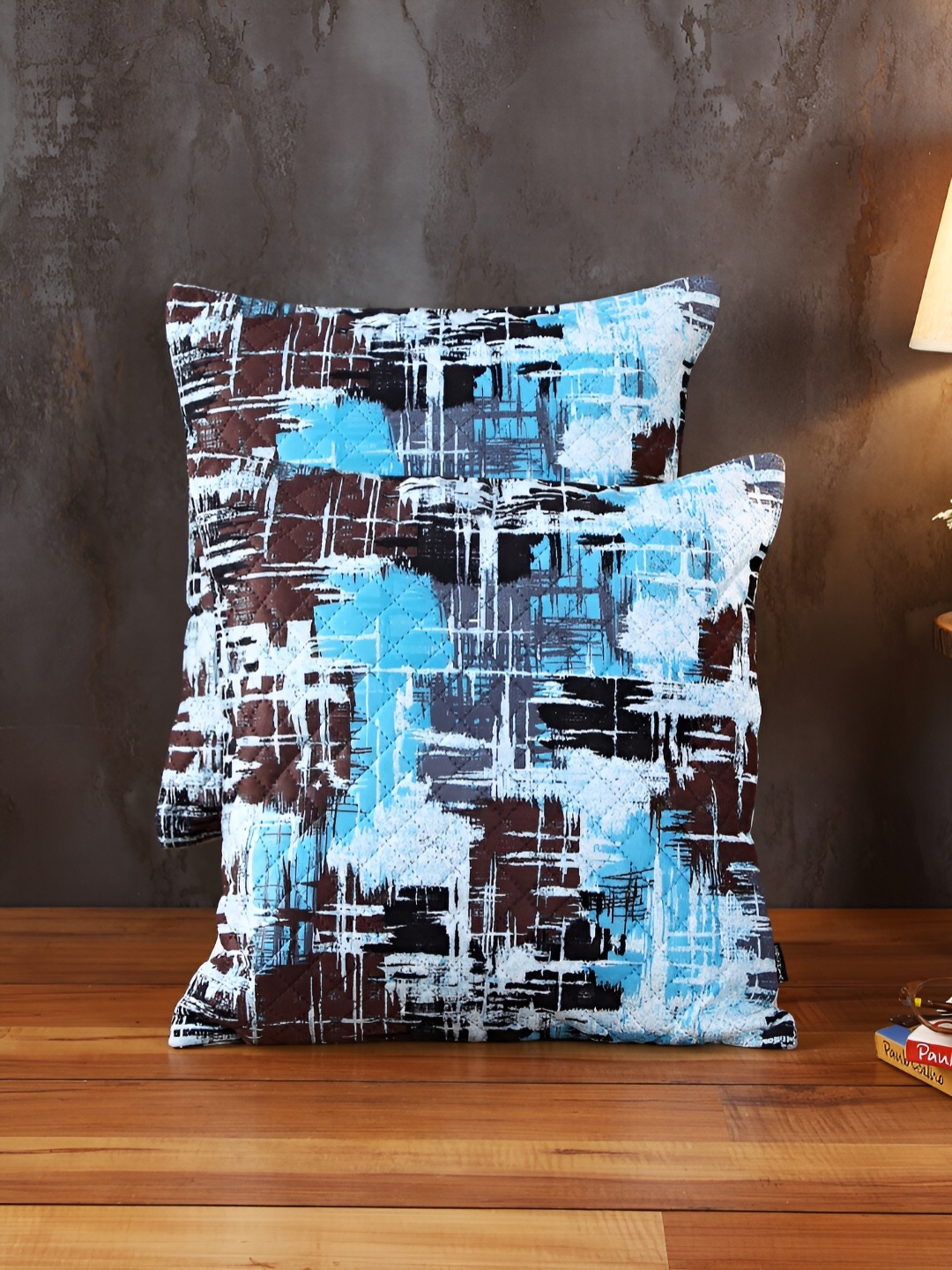 

Soumya Turquoise Blue & Brown 2 Pieces Abstract Printed Square Cushion Covers