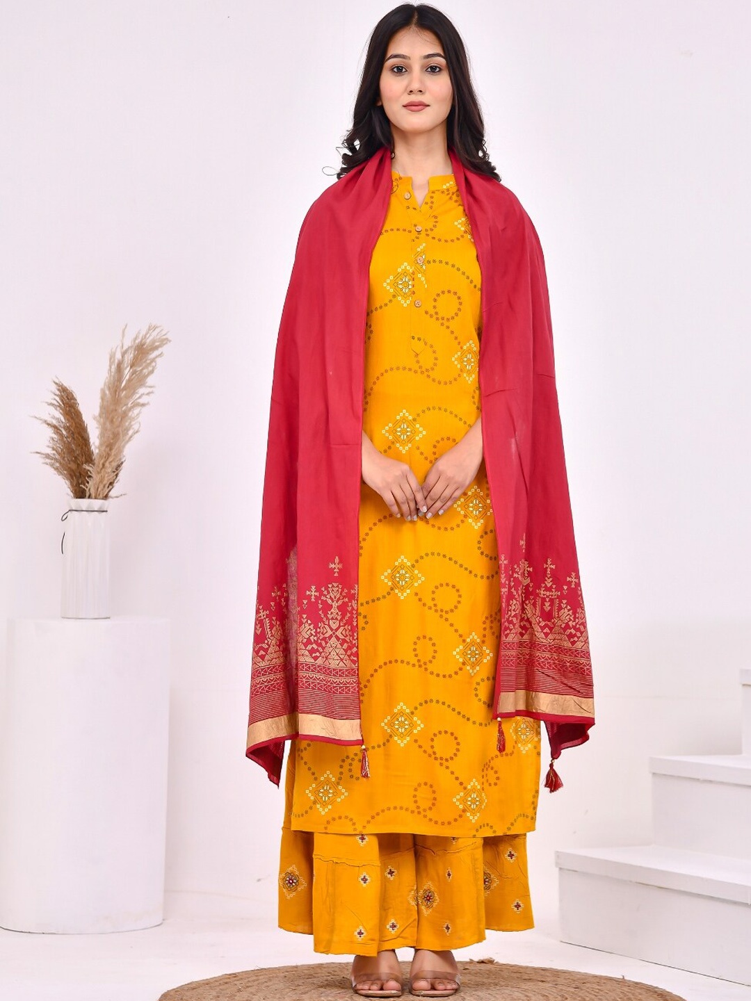 

Aspriya Floral Printed Mandarin Collar Three-Quarter Sleeves Kurta Set, Mustard