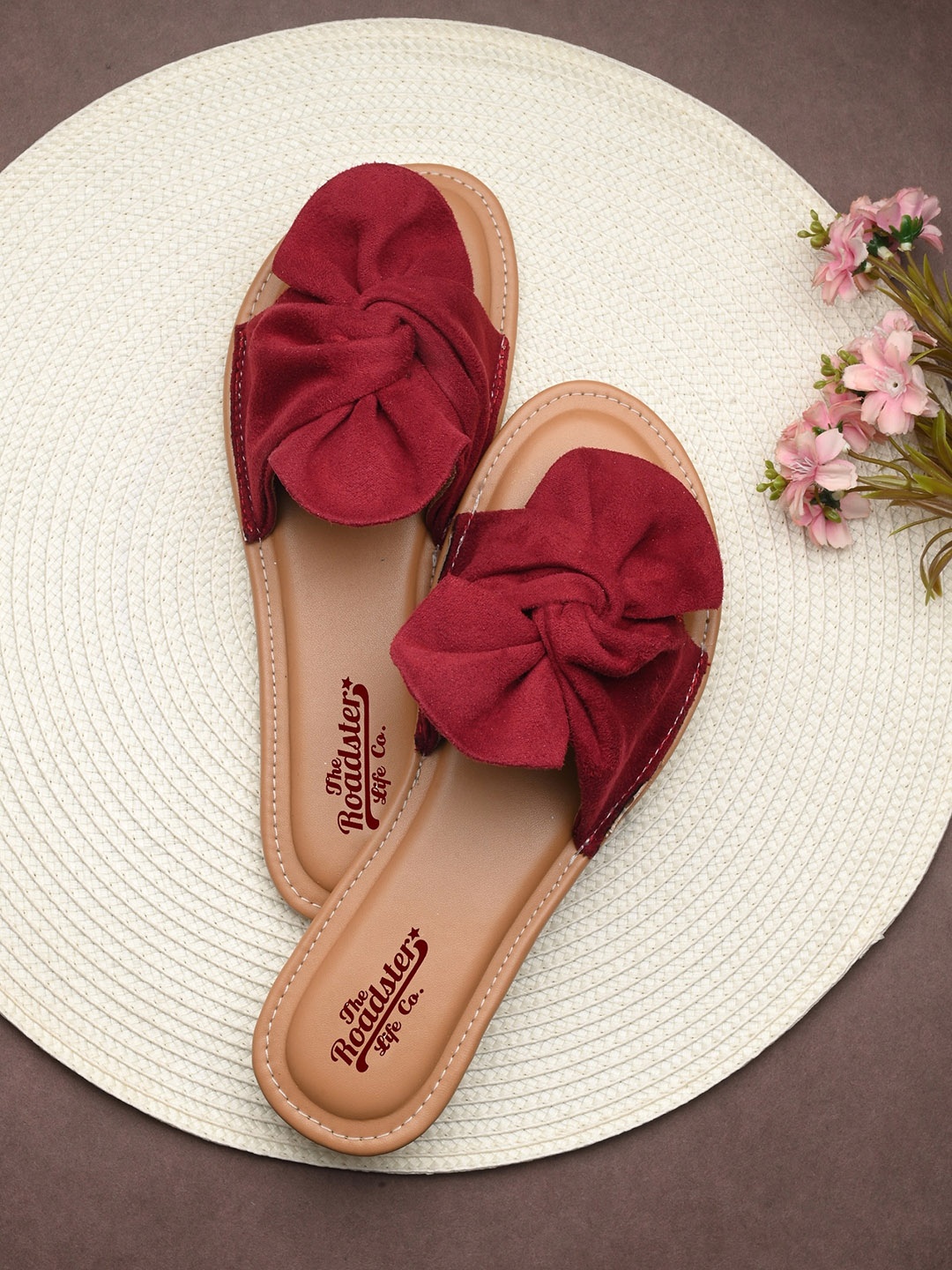 

The Roadster Lifestyle Co. Maroon Textured Bow Suede Open Toe Flats