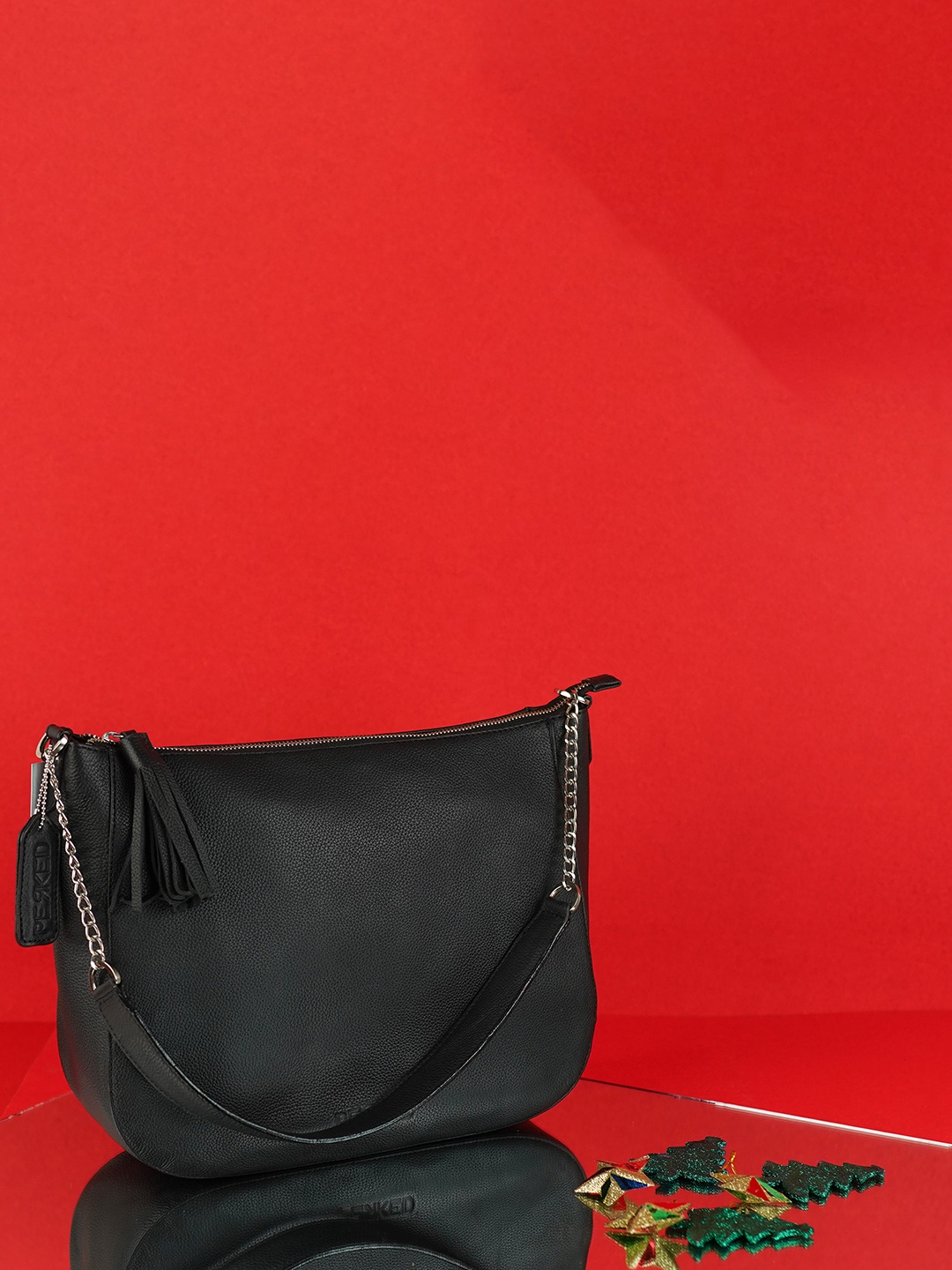 

PERKED Leather Structured Sling Bag with Tasselled, Black