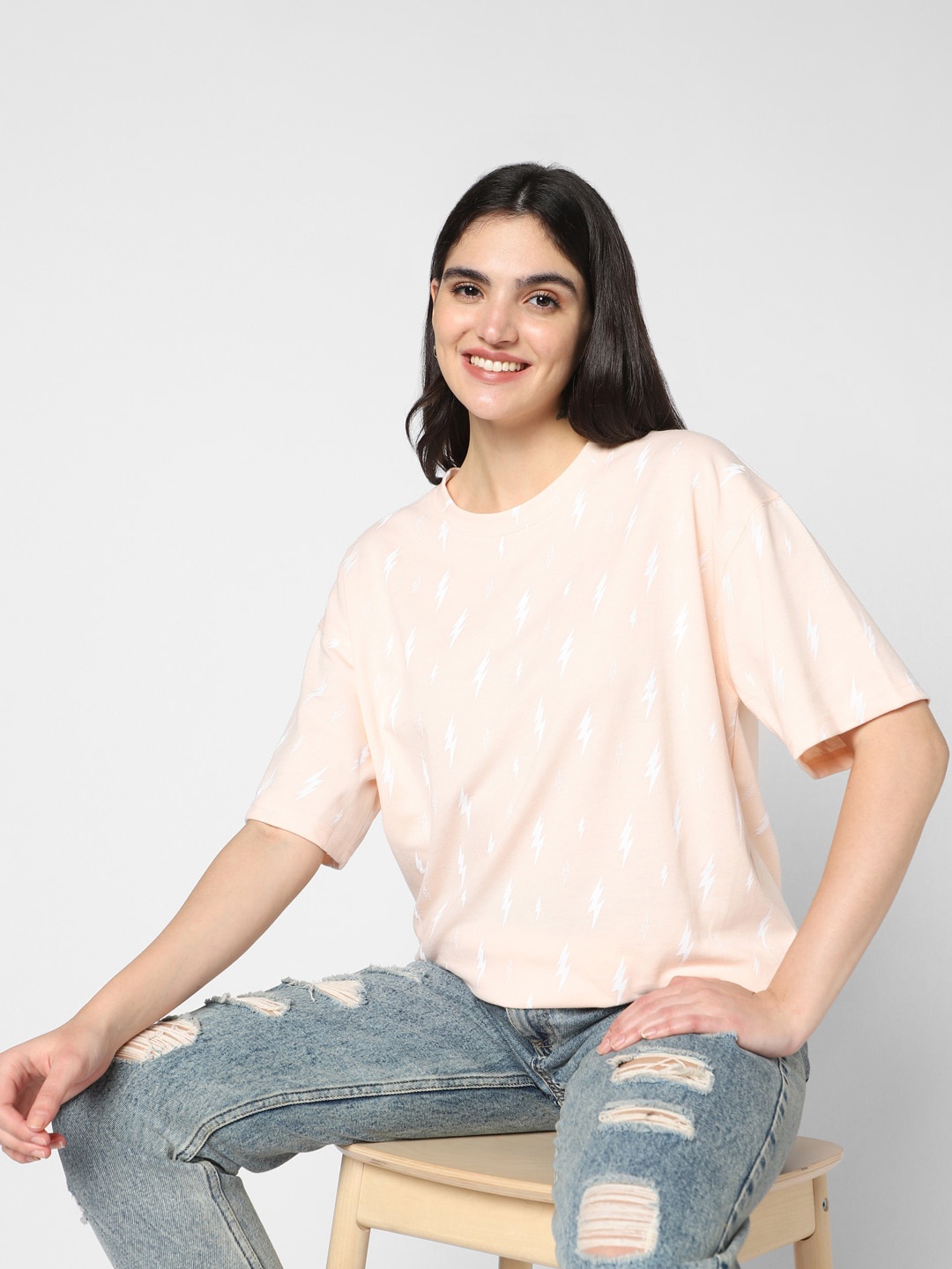 

VASTRADO Thunderbolt Printed Round Neck Drop-Shoulder Sleeves Cotton Oversized T-shirt, Peach