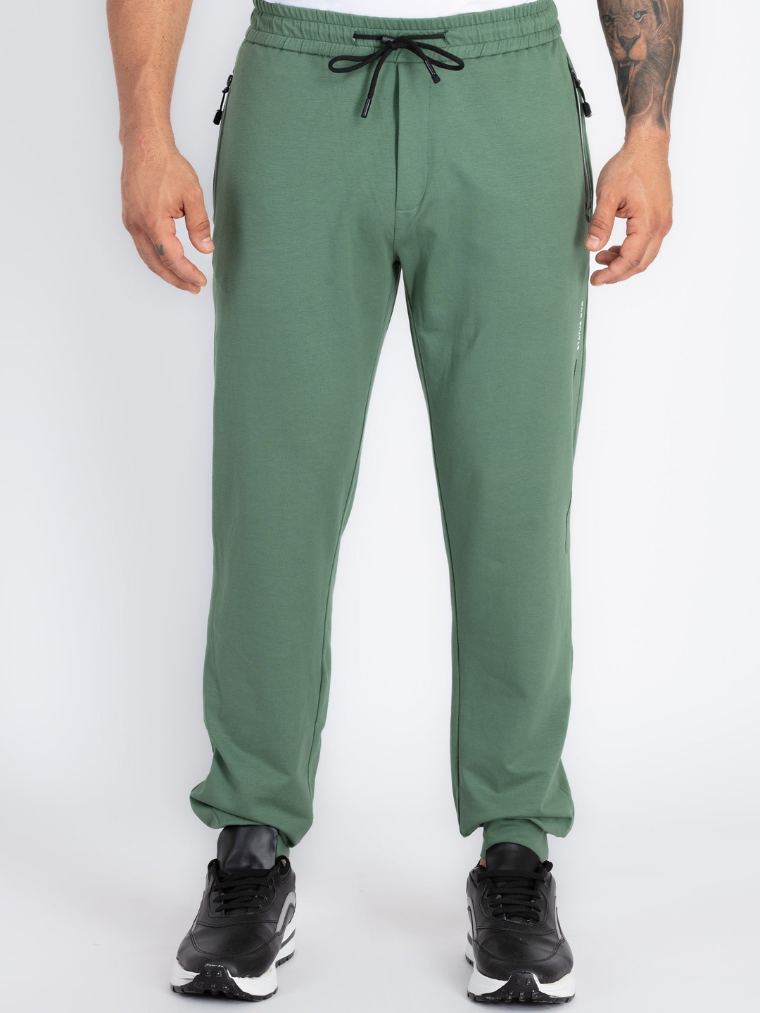 

Status Quo Men Side Pockets Regular Fit Joggers, Green