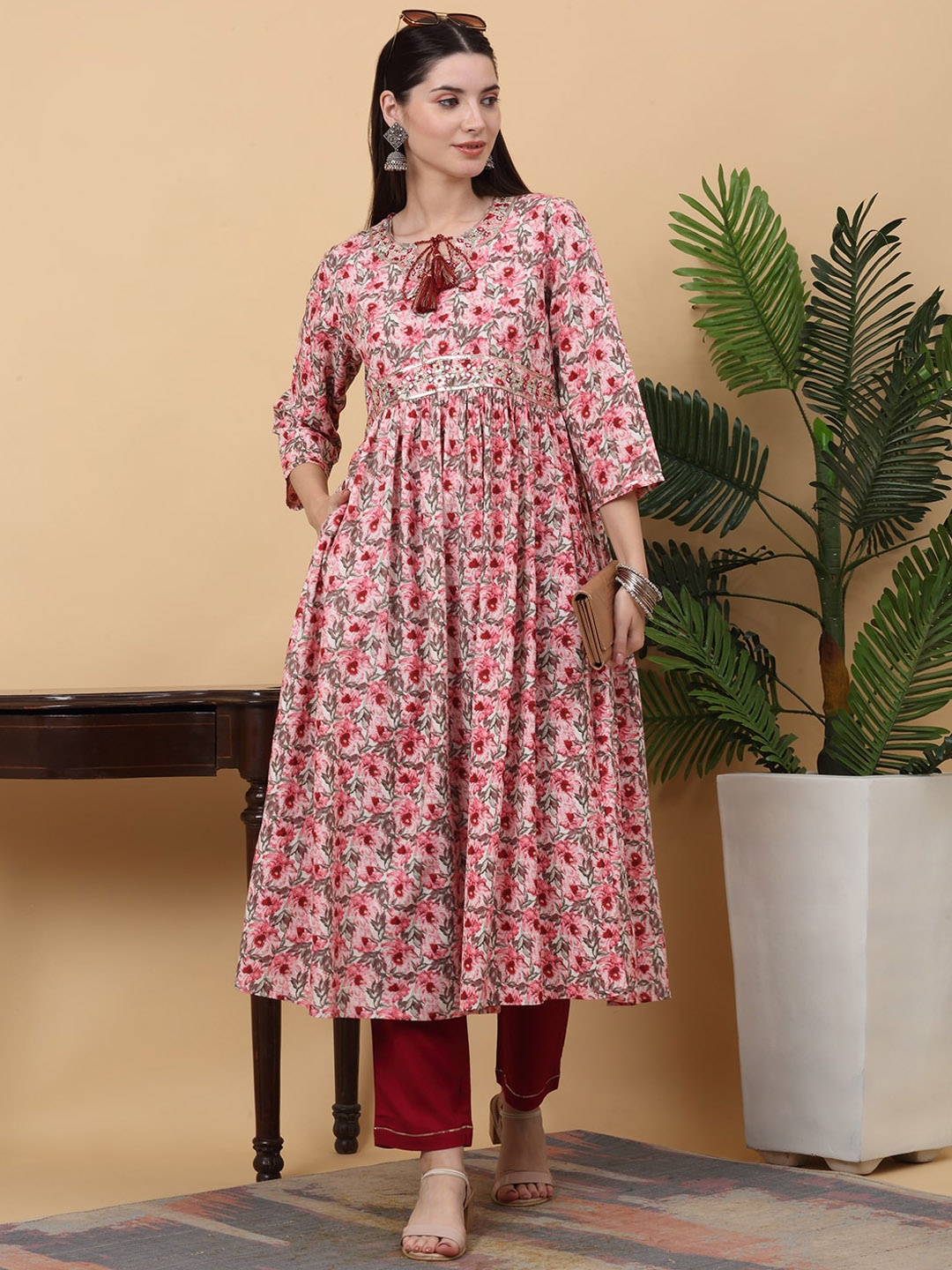 

KALINI Floral Printed Tie-Up Neck Three-Quarter Sleeves Kurta Set, Pink