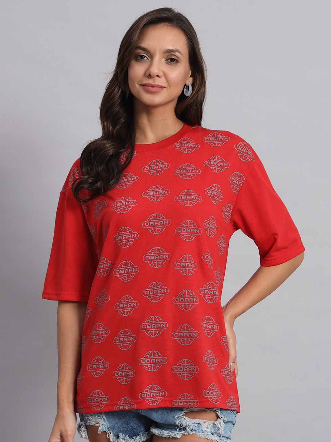 

Obaan Women Floral Printed Pockets T-shirt, Rust