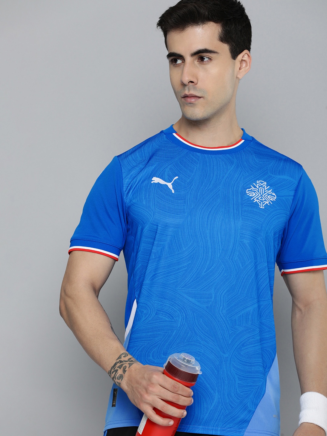 

Puma Men Iceland 2024 Home Football Printed dryCELL T-shirt, Blue