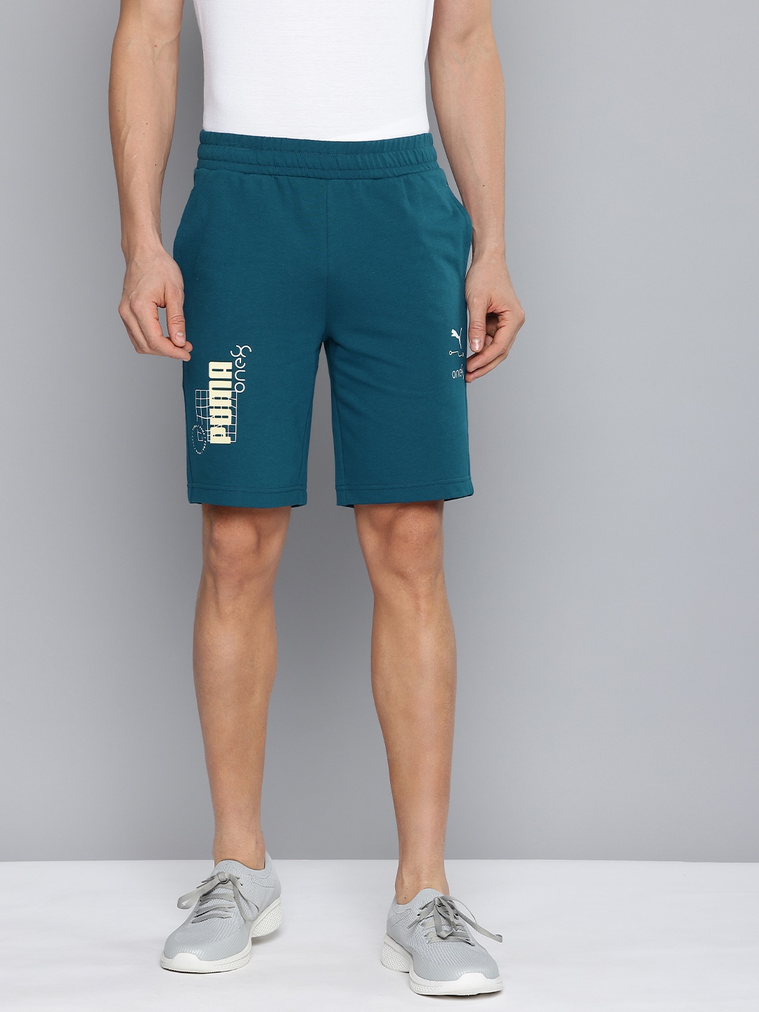 

one8 x PUMA Men Typography Printed Slim Fit Shorts, Teal