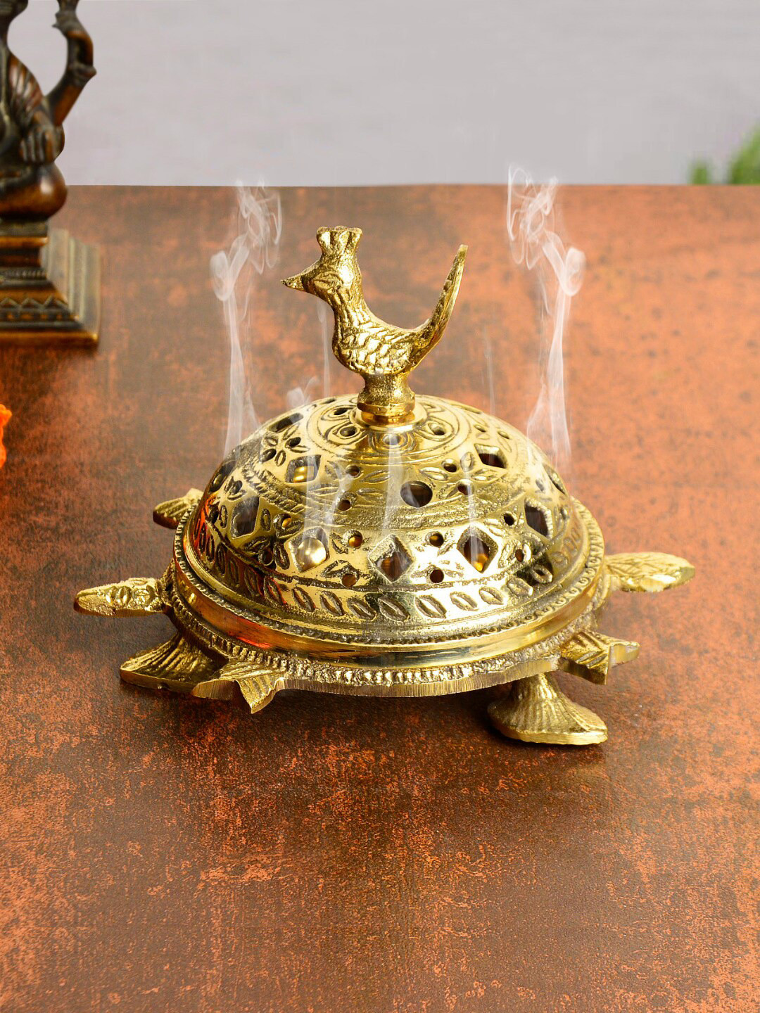 

StyleMyWay Gold Toned Brass Loban Burner with Peacock