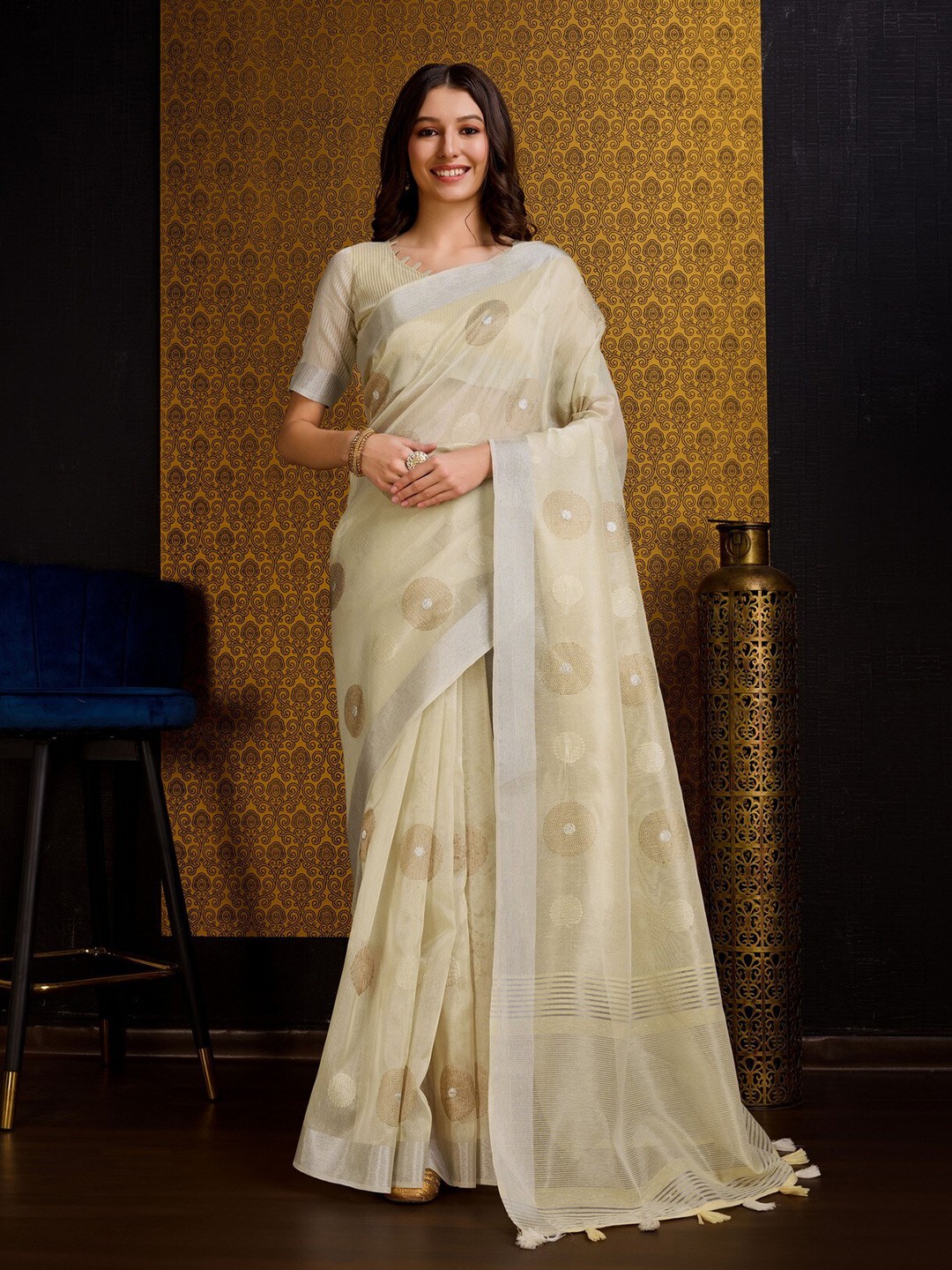 

Mitera Yellow Floral Embroidered Zari Linen Blend Saree
