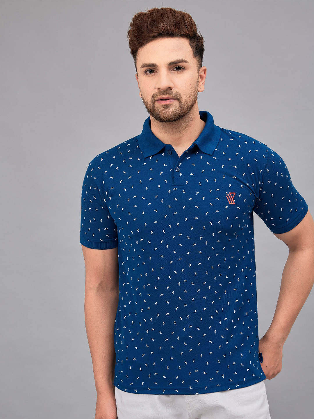 

WE PERFECT Men Printed Polo Collar Pockets T-shirt, Blue