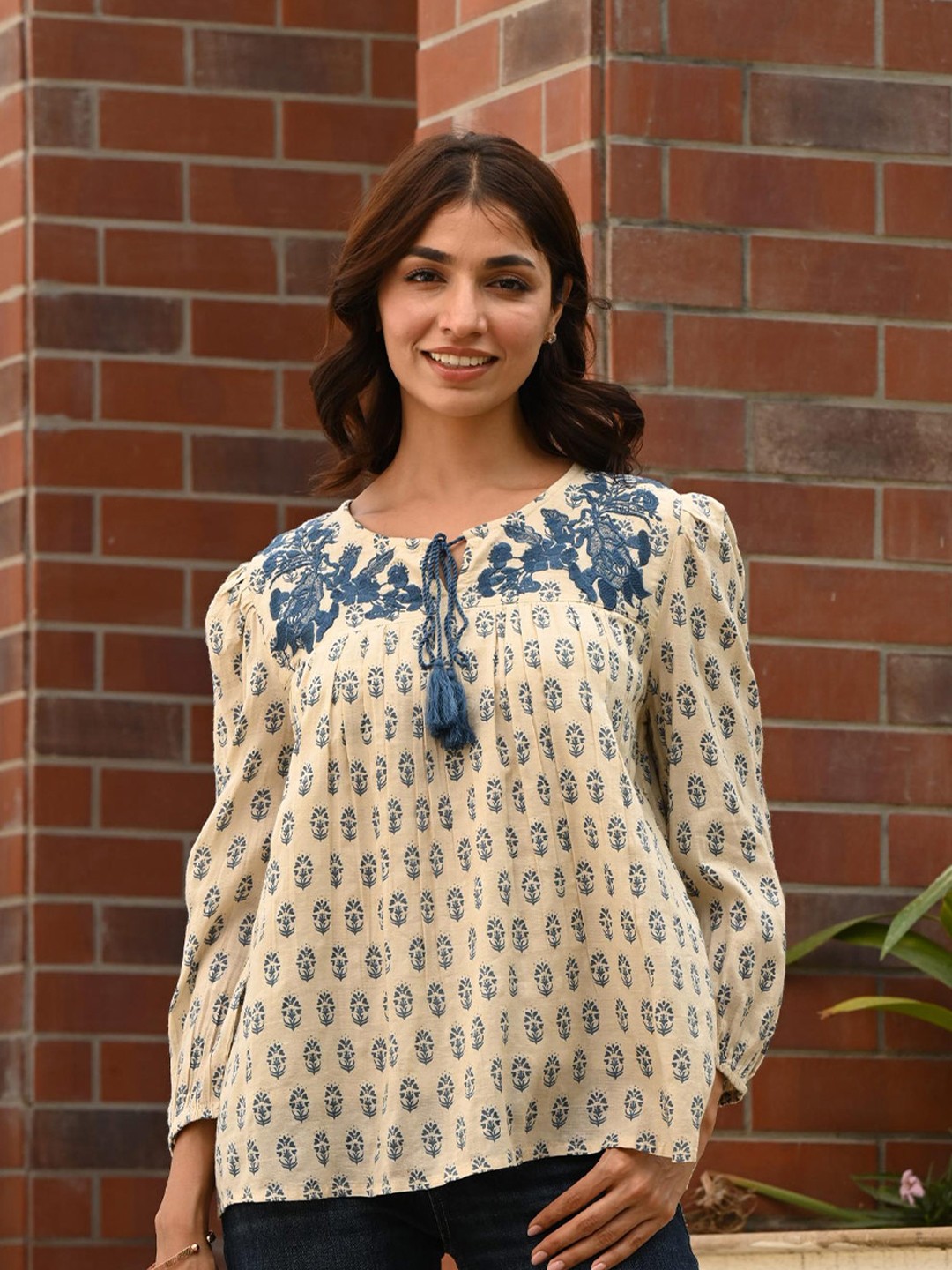 

Nyaro Floral Printed Tie-Up Neck Regular Embroidered Top, Beige