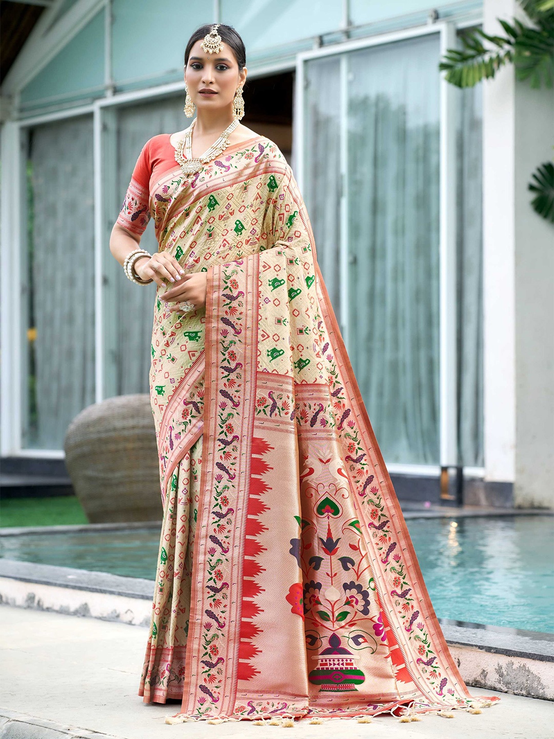 

Mitera Beige & Green Ethnic Motifs Woven Design Zari Patola Saree