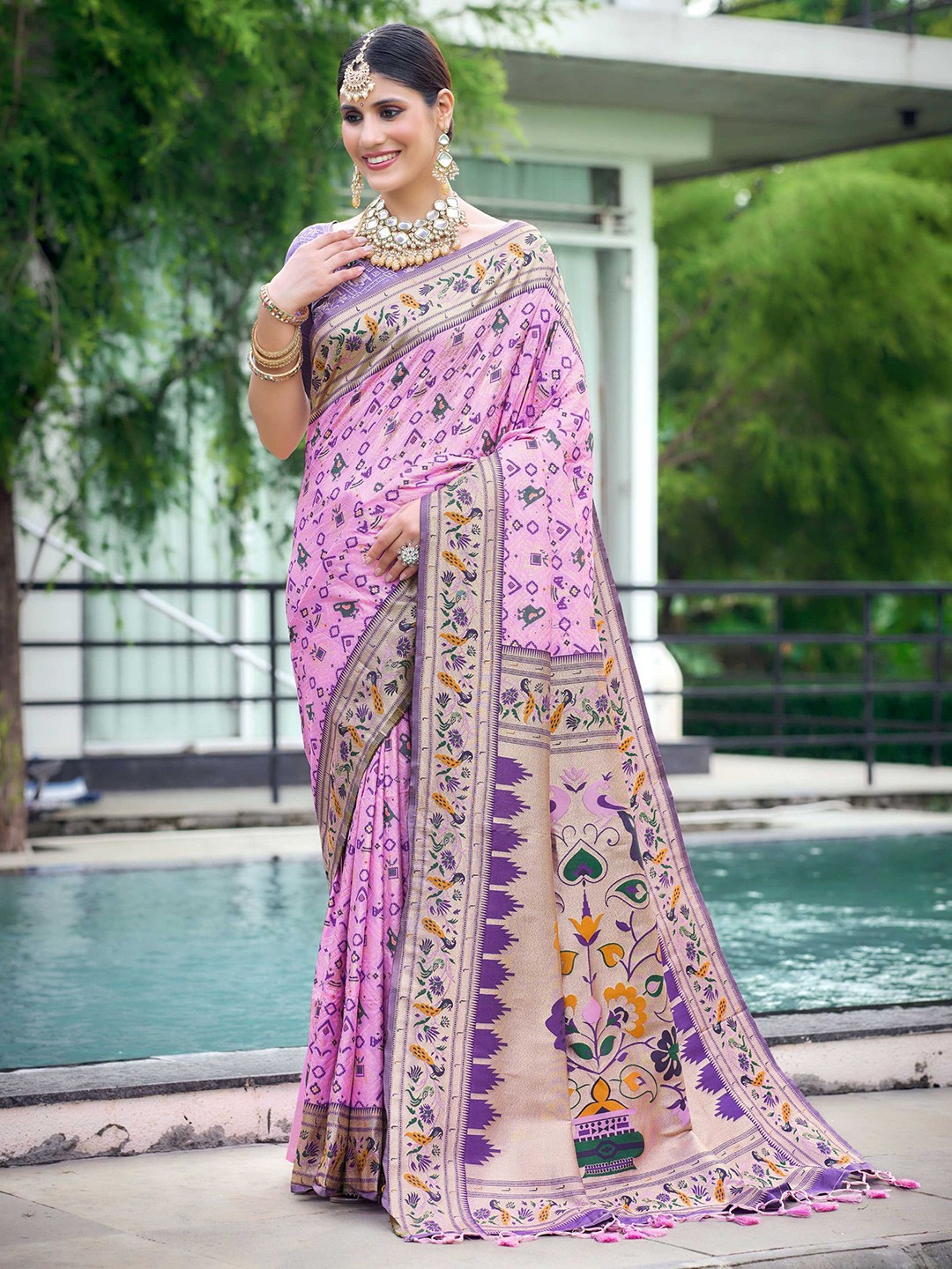 

Mitera Pink Ethnic Motifs Woven Design Zari Patola Saree