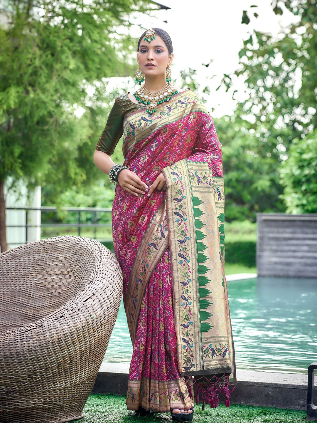 

Mitera Purple Ethnic Motifs Woven Design Zari Patola Saree