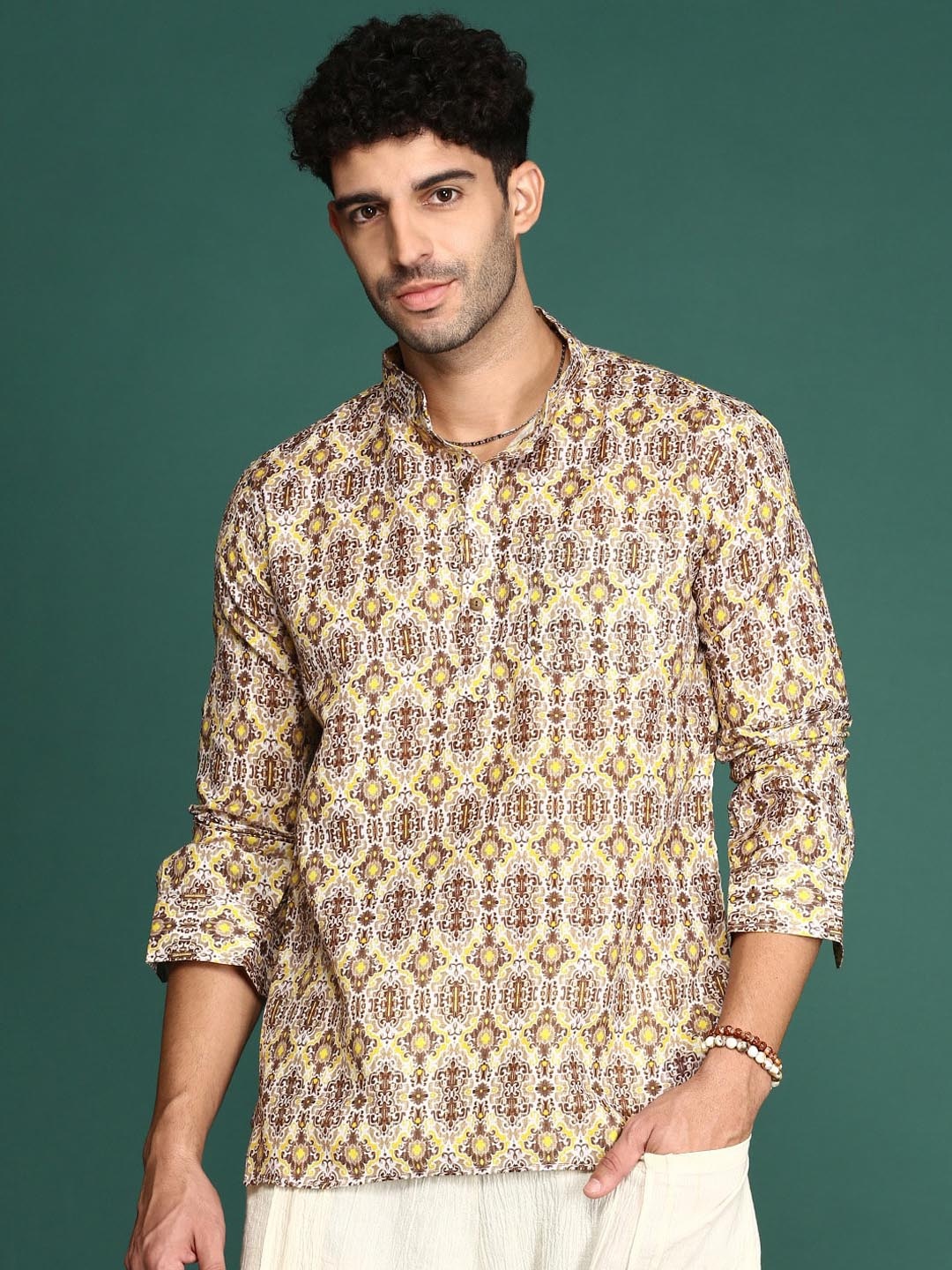 

Sangria Ethnic Motifs Printed Cotton Mandarin Collar Short Kurta, Yellow