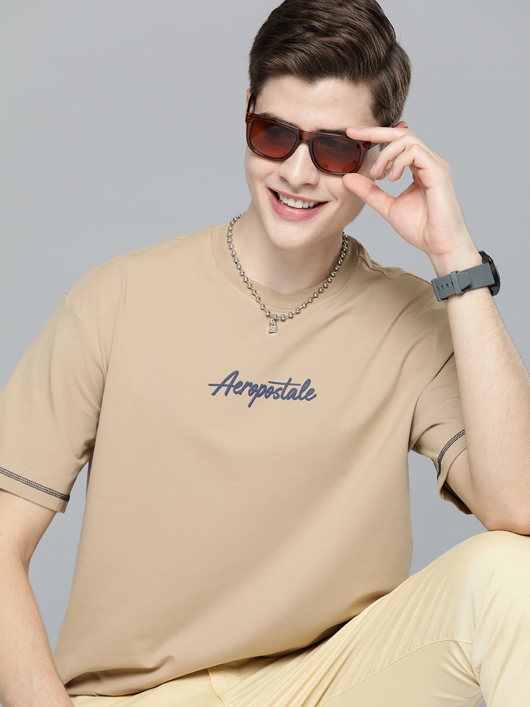 

Aeropostale Men Brand Logo Printed T-shirt, Beige