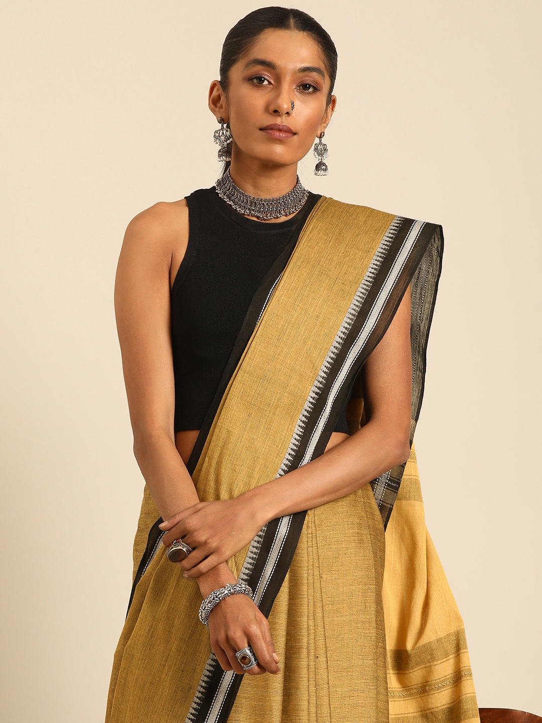 

Taavi Solid Pure Cotton Taant Saree, Yellow