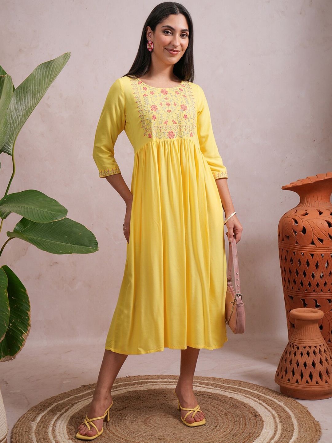 

Vishudh Yellow Floral Embroidered A-Line Midi Dress