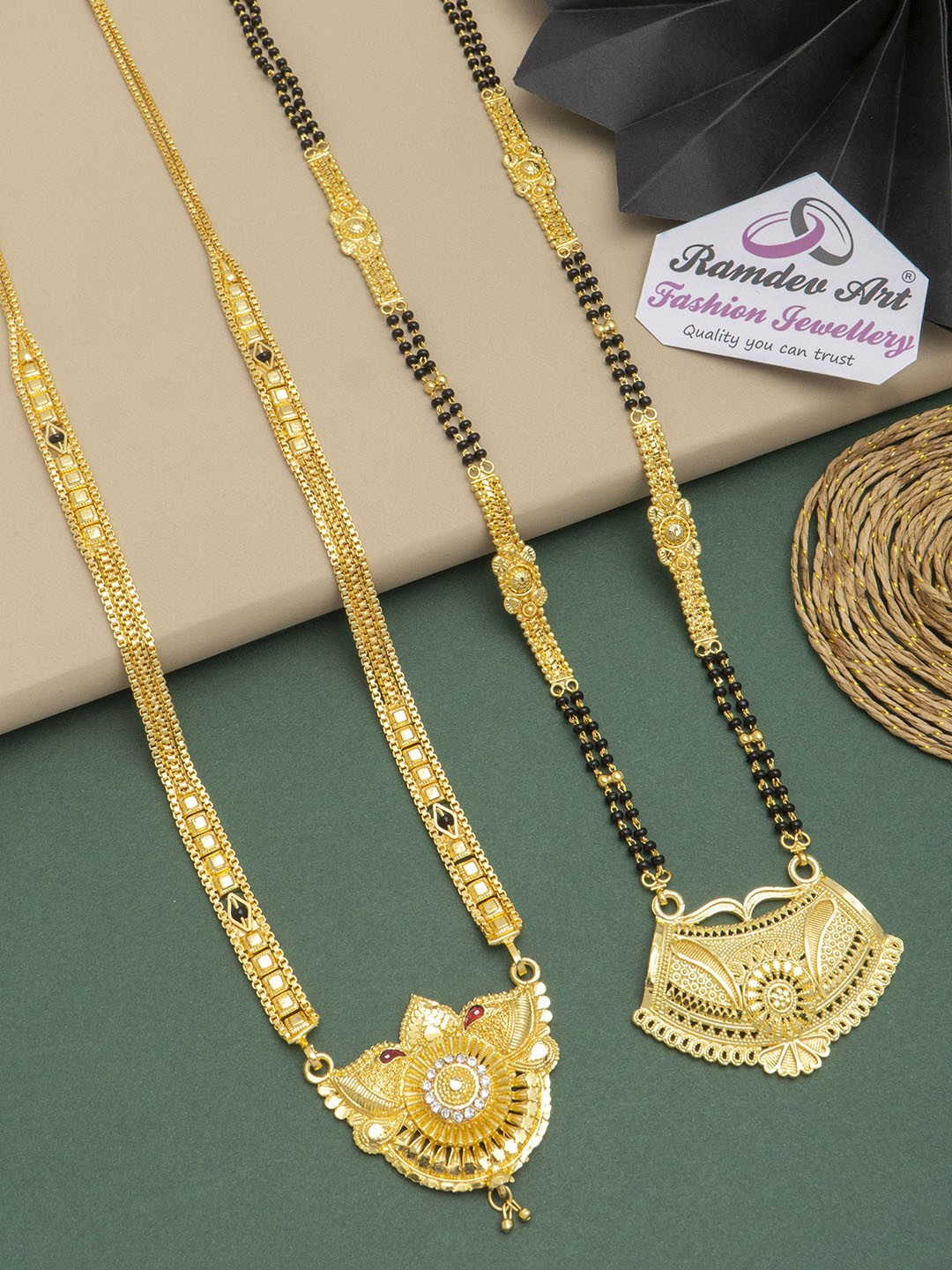 

Ramdev Art Fashion Jwellery Set Of 2 Gold-Plated Stone-Studded & Beaded Mangalsutra