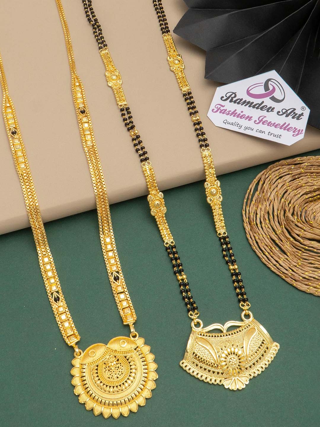 

Ramdev Art Fashion Jwellery Set Of 2 Gold-Plated Stone-Studded & Beaded Mangalsutra