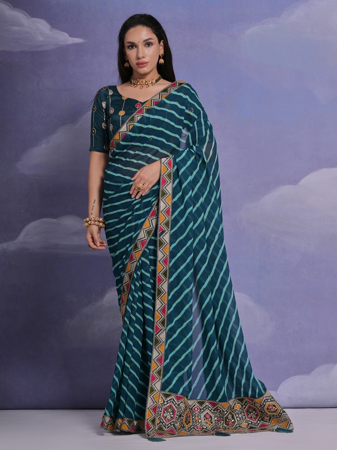 

Kalista Striped Embroidered Pure Georgette Saree, Teal