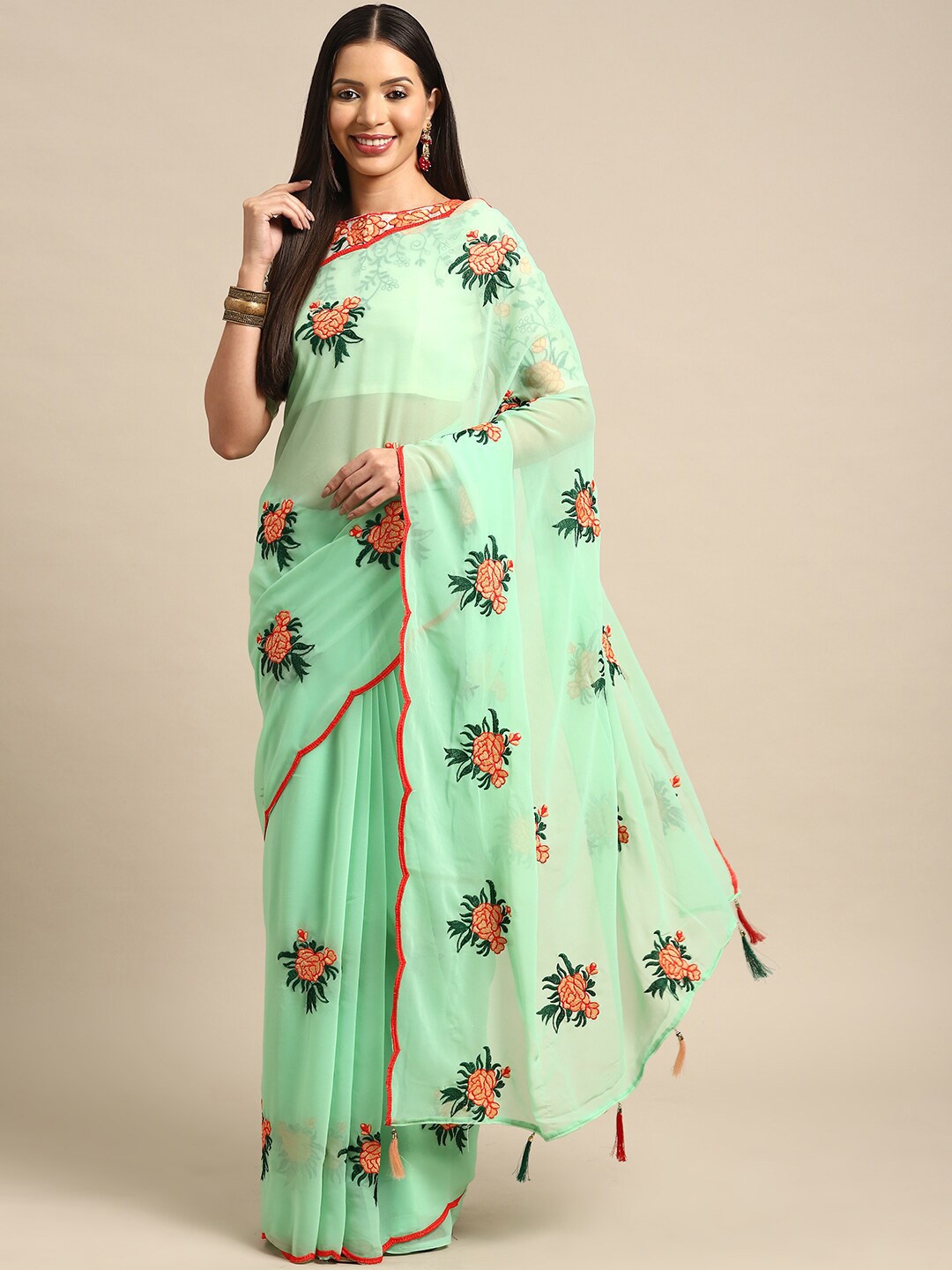

Mitera Green Floral Embroidered Pure Georgette Saree