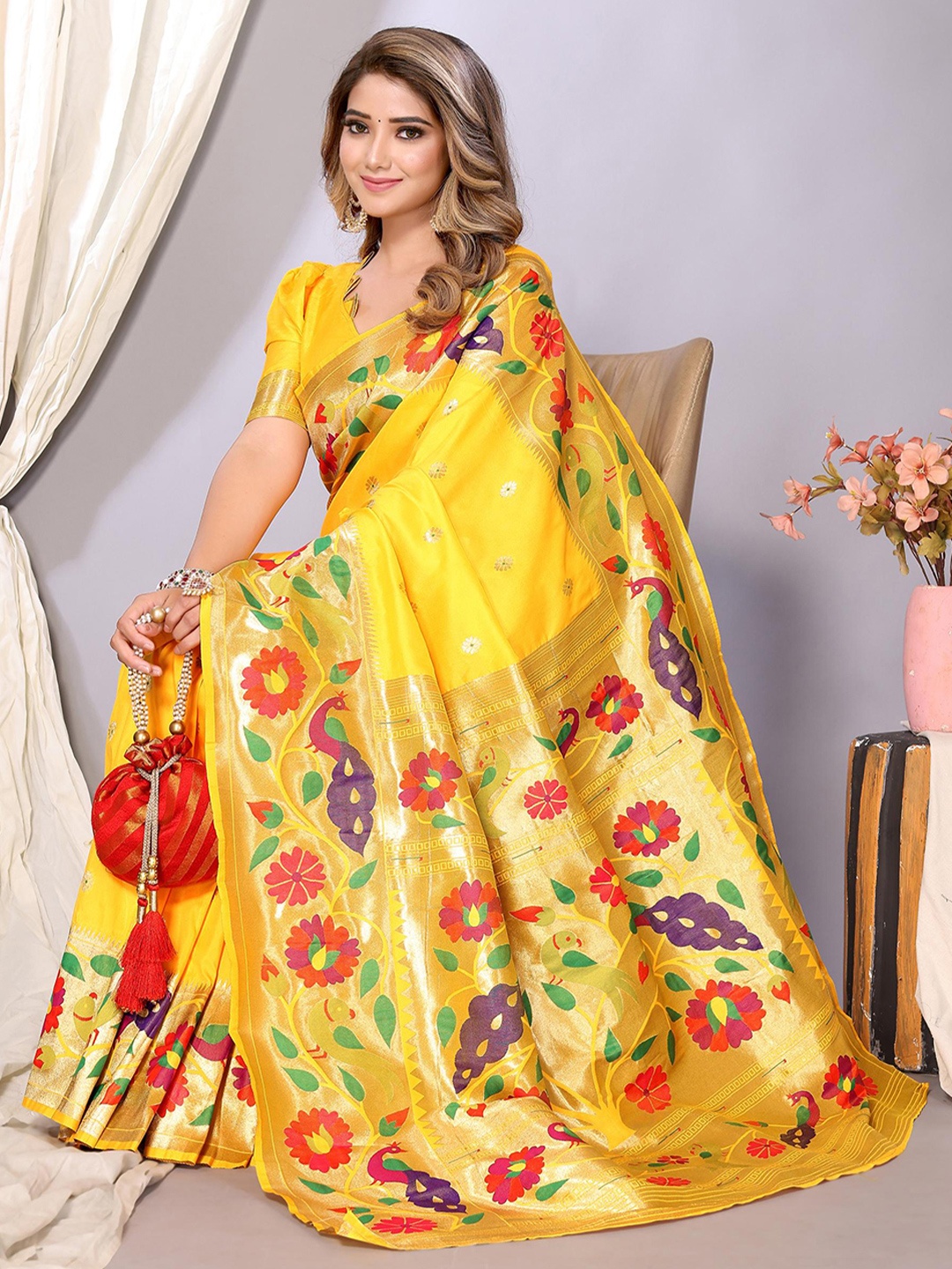 

DIVASTRI Ethnic Motifs Woven Design Zari Paithani Saree, Yellow