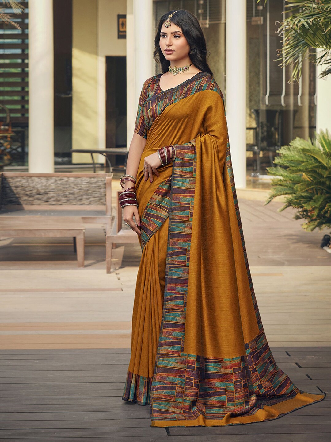 

Satrani Mustard Yellow Printed Bhagalpuri Saree