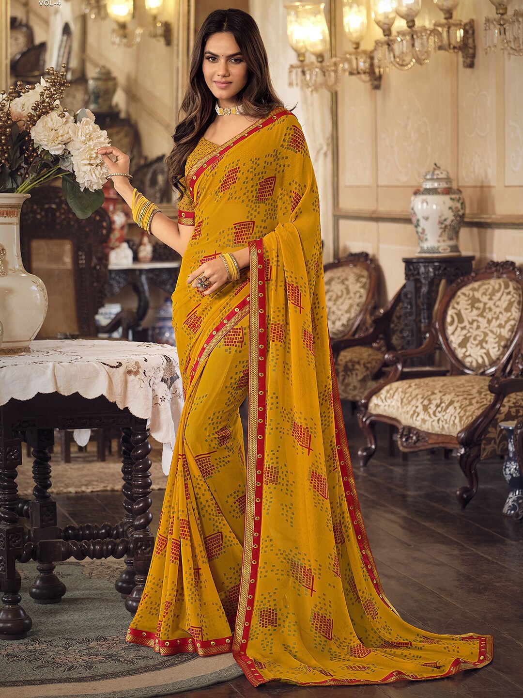 

Mitera Yellow Geometric Printed Gotta Patti Sungudi Saree