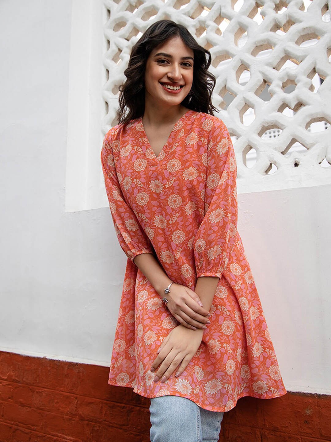 

Janasya Women Orange Georgette Floral Printed Regular Tunic