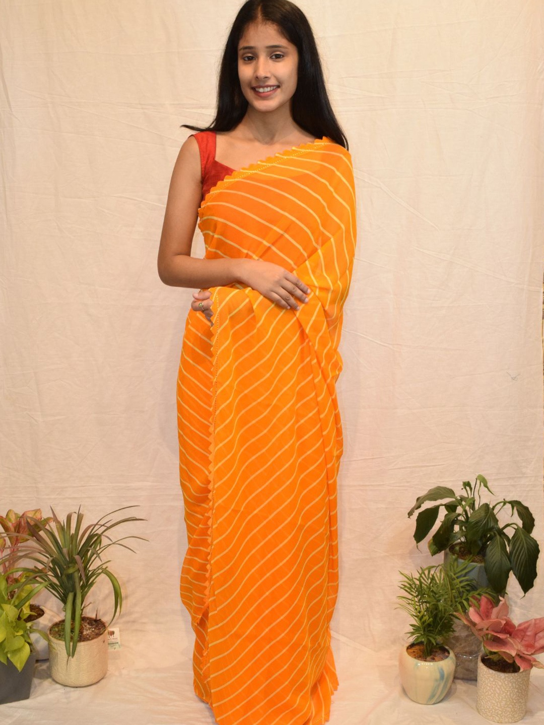 

PRETTY PALLU Leheriya Printed Saree, Yellow
