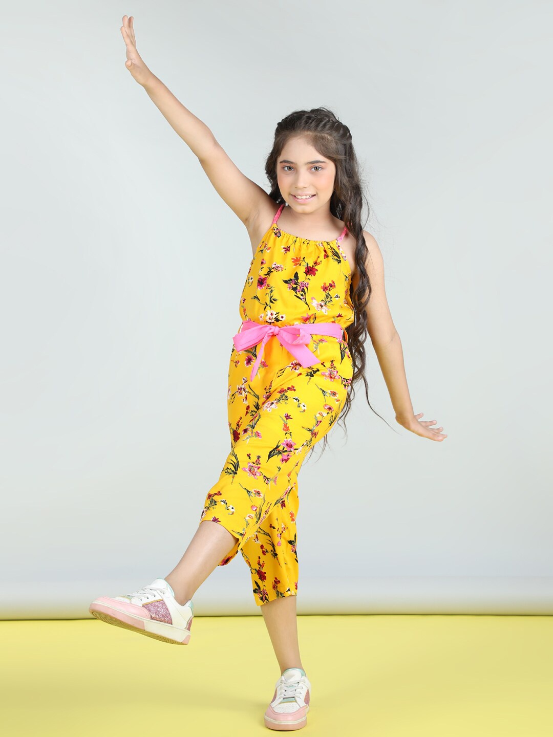 

StyleStone Girls Yellow Floral Printed Shoulder Straps Waist Tie Ups Basic Jumpsuit