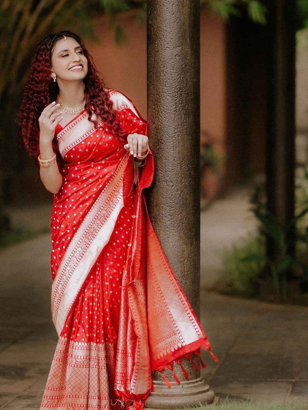 

Mitera Red Ethnic Motifs Woven Design Zari Saree