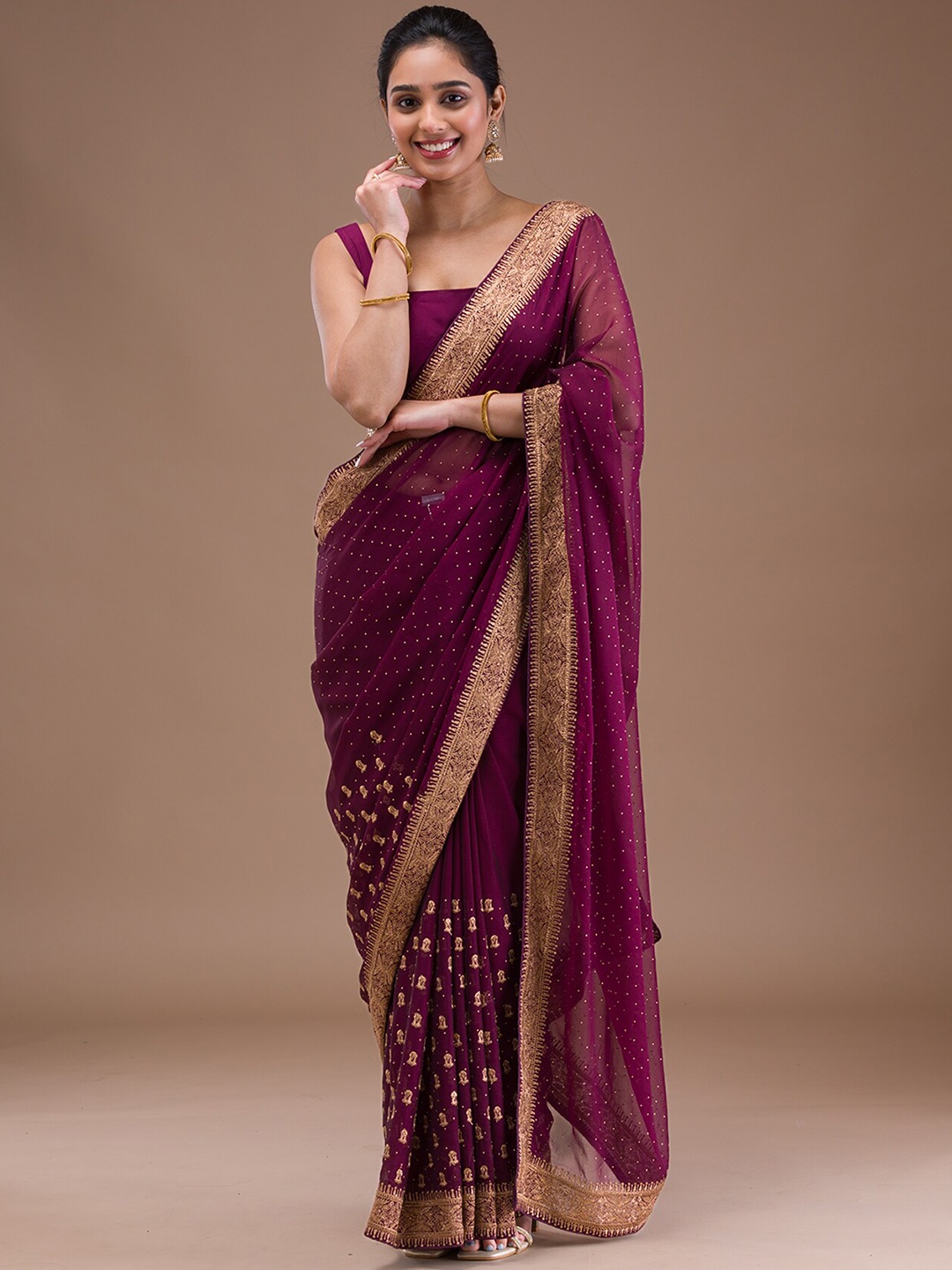 

Koskii Ethnic Motifs Embroidered Zari Saree, Purple