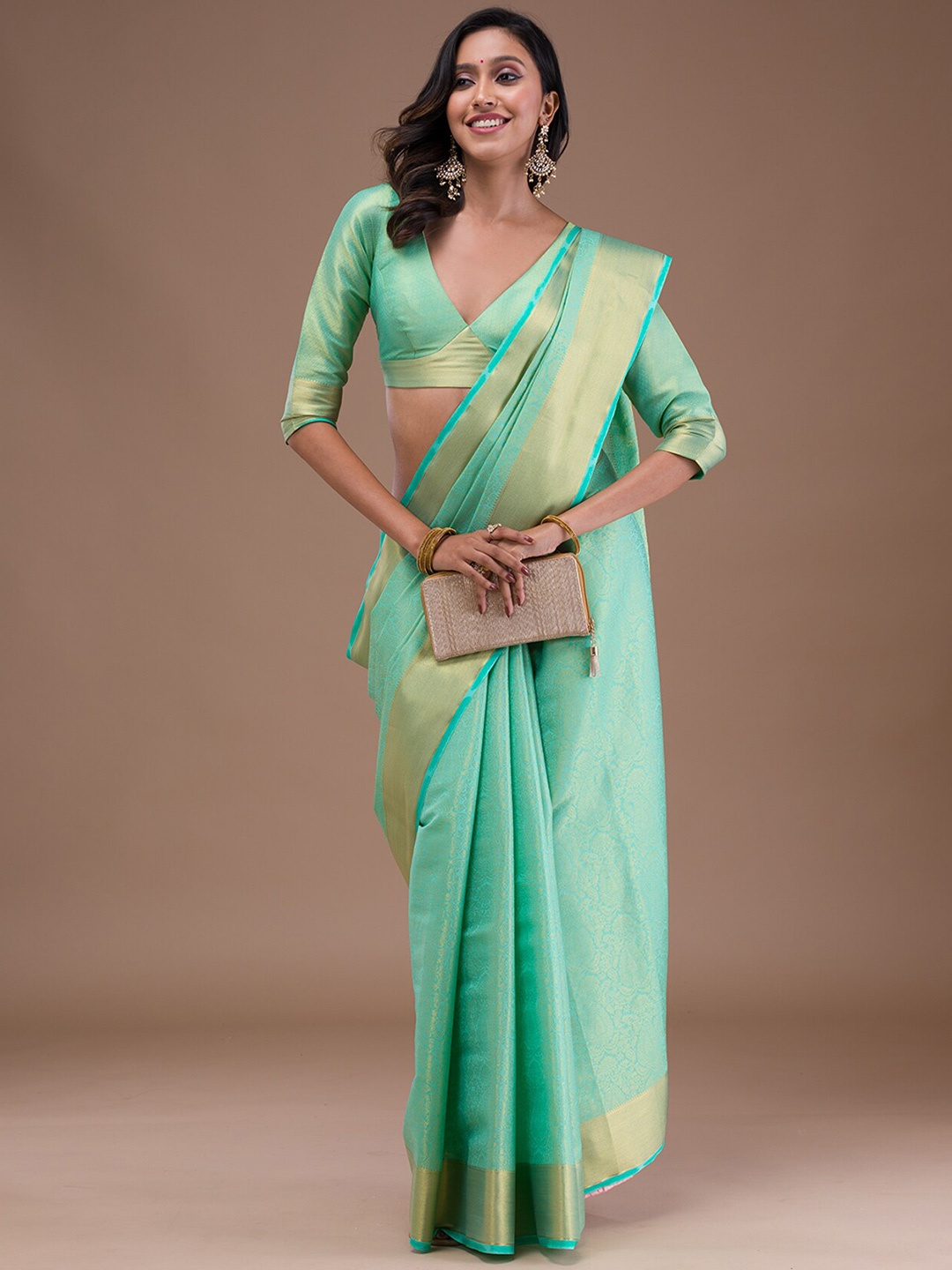 

Koskii Ethnic Motigs Woven Design Zari Saree, Green