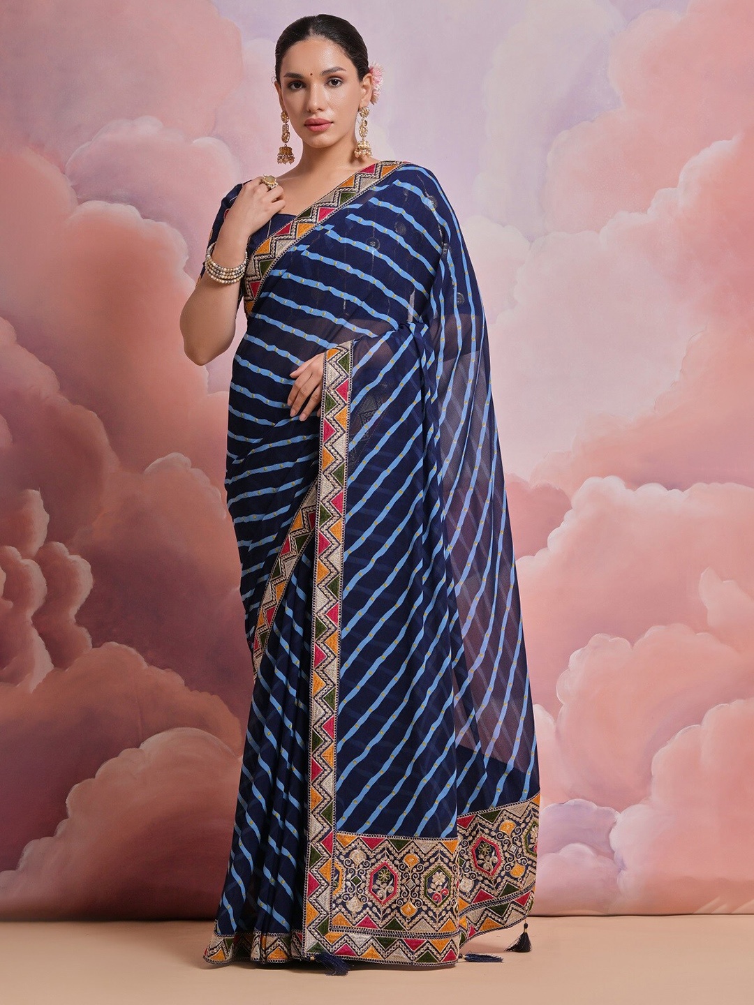 

Kalista Blue Leheriya Printed Embroidered Pure Georgette Saree
