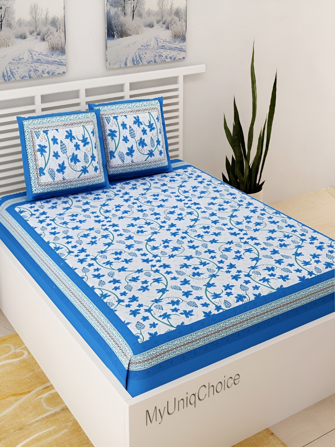 

UNIQCHOICE Blue & White Floral Printed Cotton 120 TC Queen Bedsheet With 2 Pillow Covers