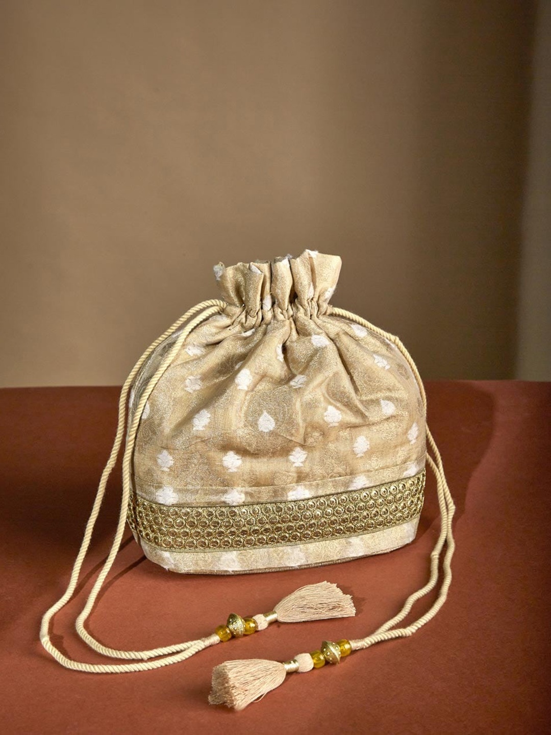 

Fabindia Printed Potli Clutch, Gold
