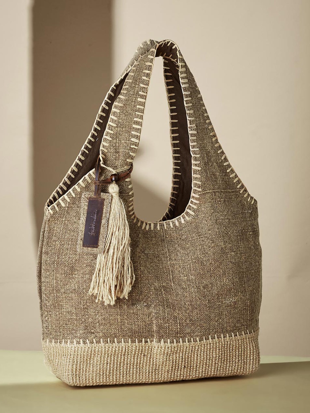 

Fabindia Oversized Structured Handheld Bag with Tasselled, Beige