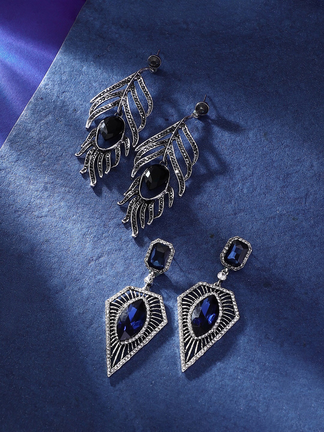 

SOHI Silver-Plated Contemporary Drop Earrings