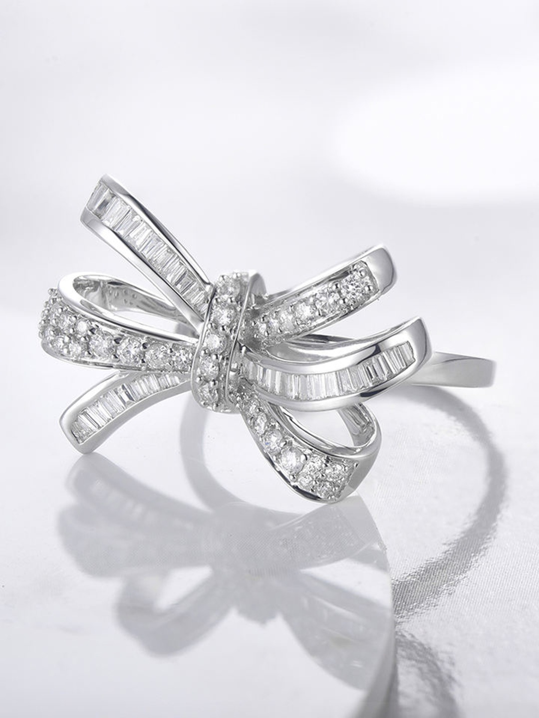 

RARE1STUDIO Silver-Plated Cubic Zirconia-Studded Floral Knot Adjustable Finger Ring