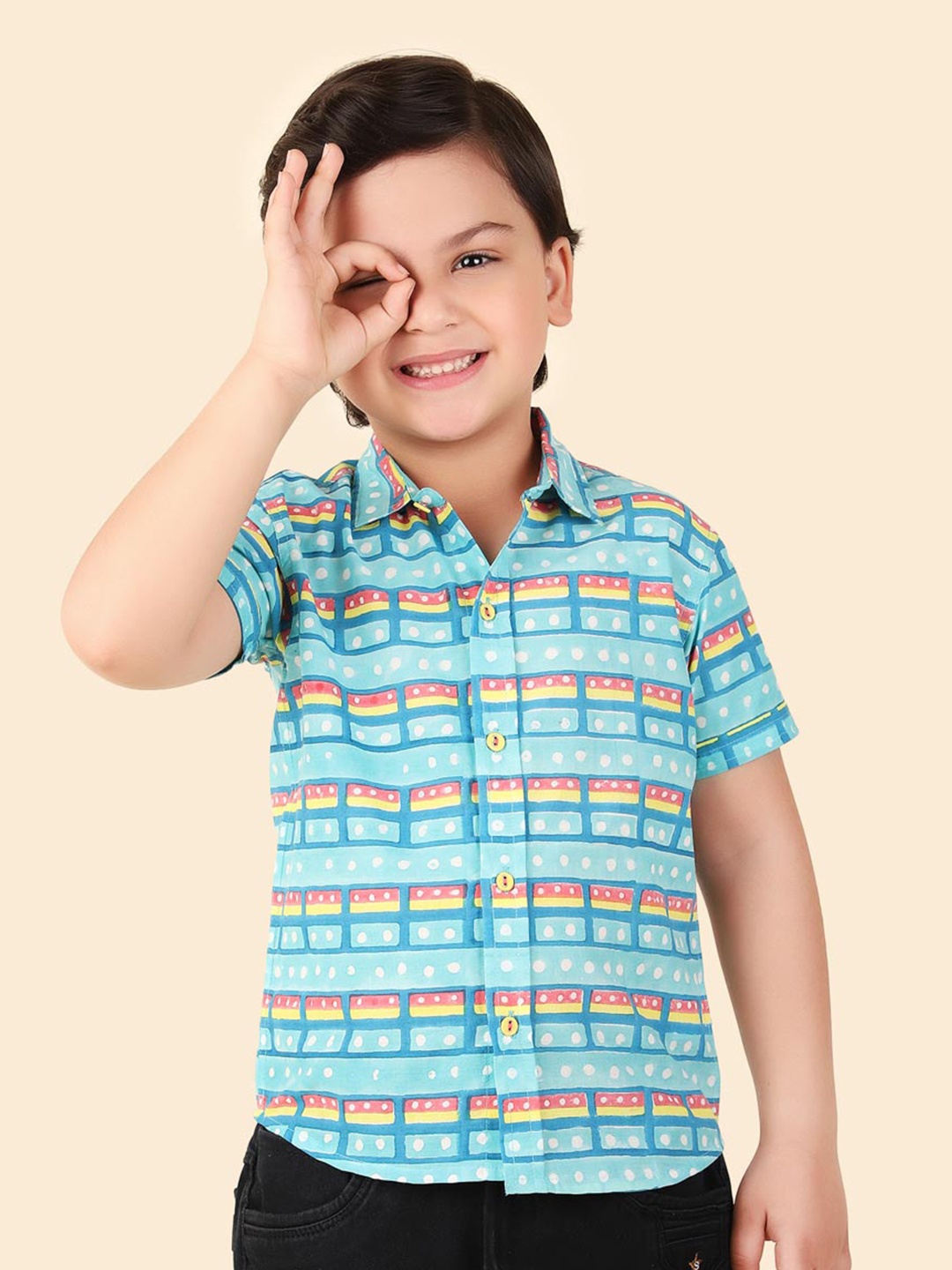 

Fabindia Boys Abstract Printed Cotton Spread Collar Curved Casual Shirt, Blue