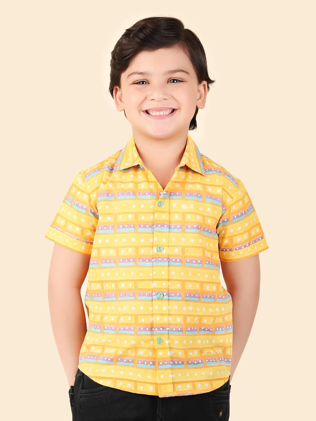 

Fabindia Boys Abstract Printed Cotton Spread Collar Curved Casual Shirt, Yellow