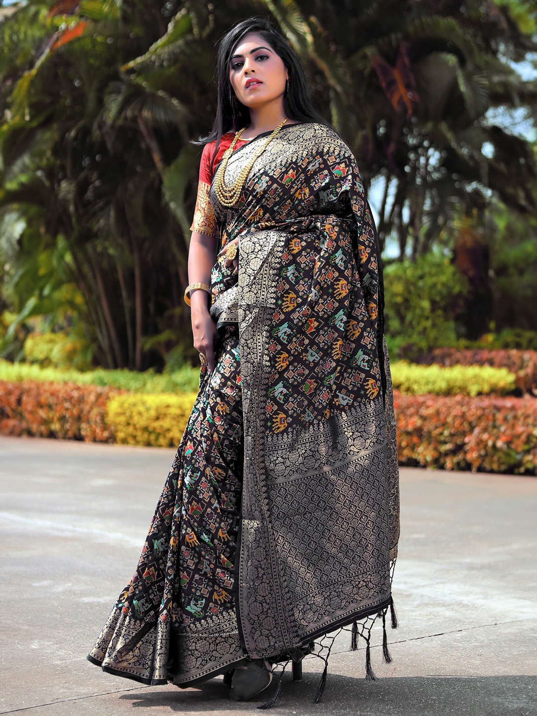 

Anouk Ethnic Motifs Printed Zari Pure Silk Patola Saree, Black