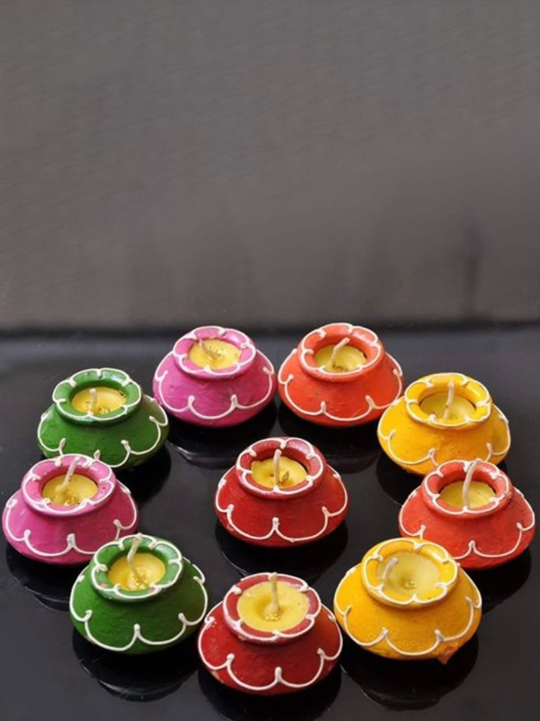 

PUFFSMART Pink & Yellow 10 Pieces Printed Matki Diya Candles