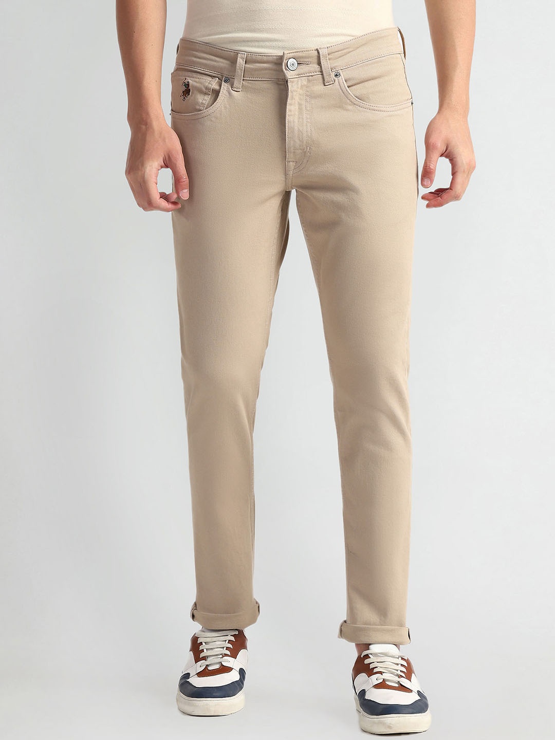 

U.S. Polo Assn. Denim Co. Men Brandon Tapered Fit Mid-Rise Clean Look Stretchable Jeans, Beige