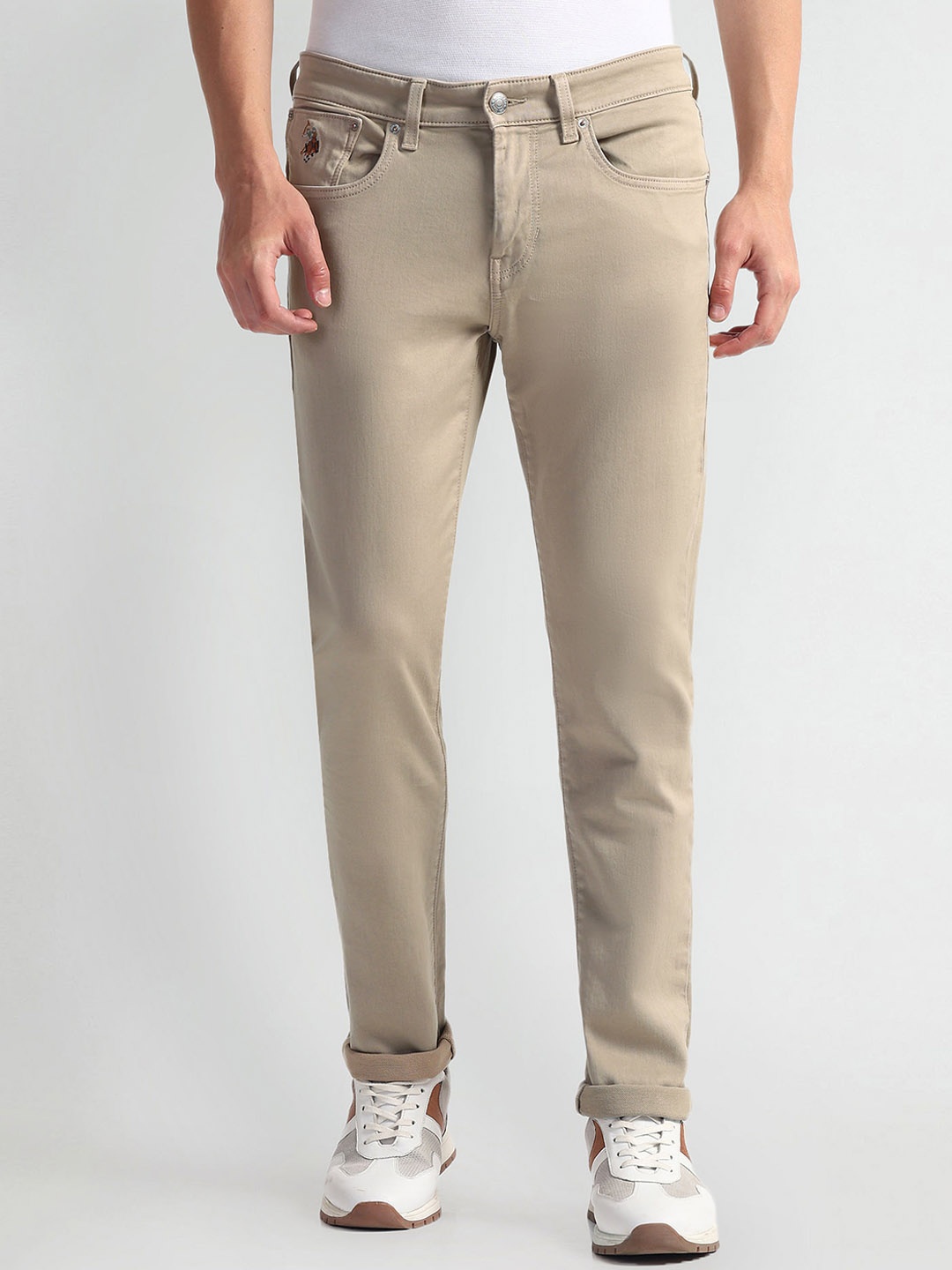

U.S. Polo Assn. Denim Co. Men Harold Slim Fit Mid-Rise Clean Look Stretchable Jeans, Beige