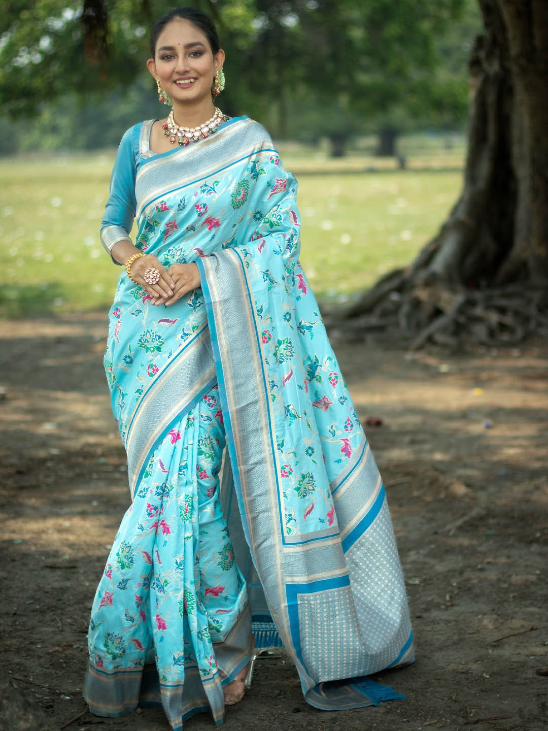 

Kandora Floral Woven Designed Zari Pure Silk Banarasi Saree, Blue
